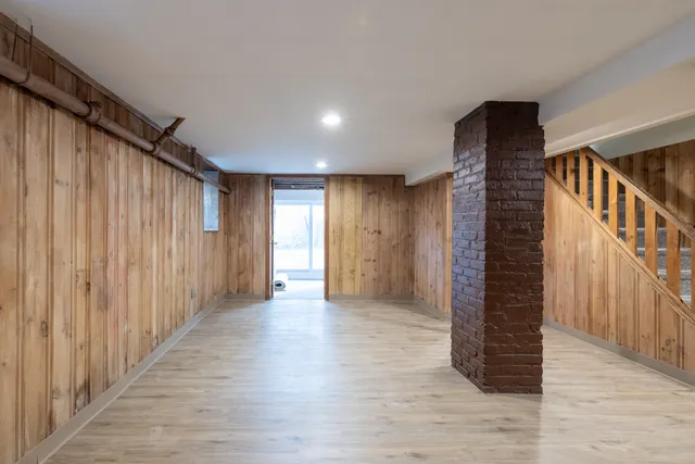a view of entryway with wooden floor