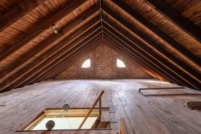 a view of outdoor space and wooden floor