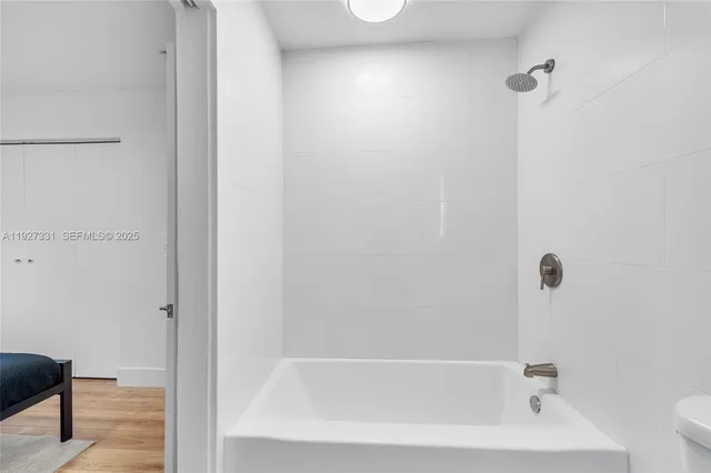 a bathroom with a bathtub