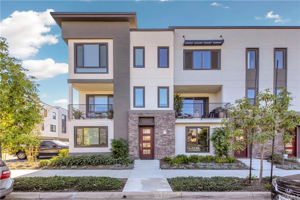 149 Schick Irvine, CA 92614 - Photo 1 of 1 a front view of a multi story residential apartment building