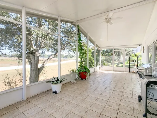 a view of a porch and garden