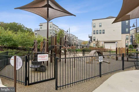 a view of a building with sitting area