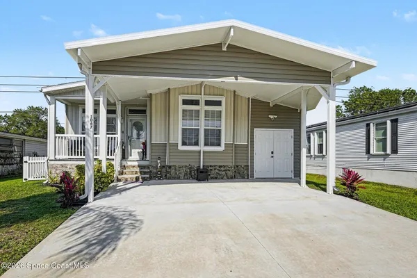 $327,900 | 1067 Wren Circle, Barefoot Bay, FL 32976