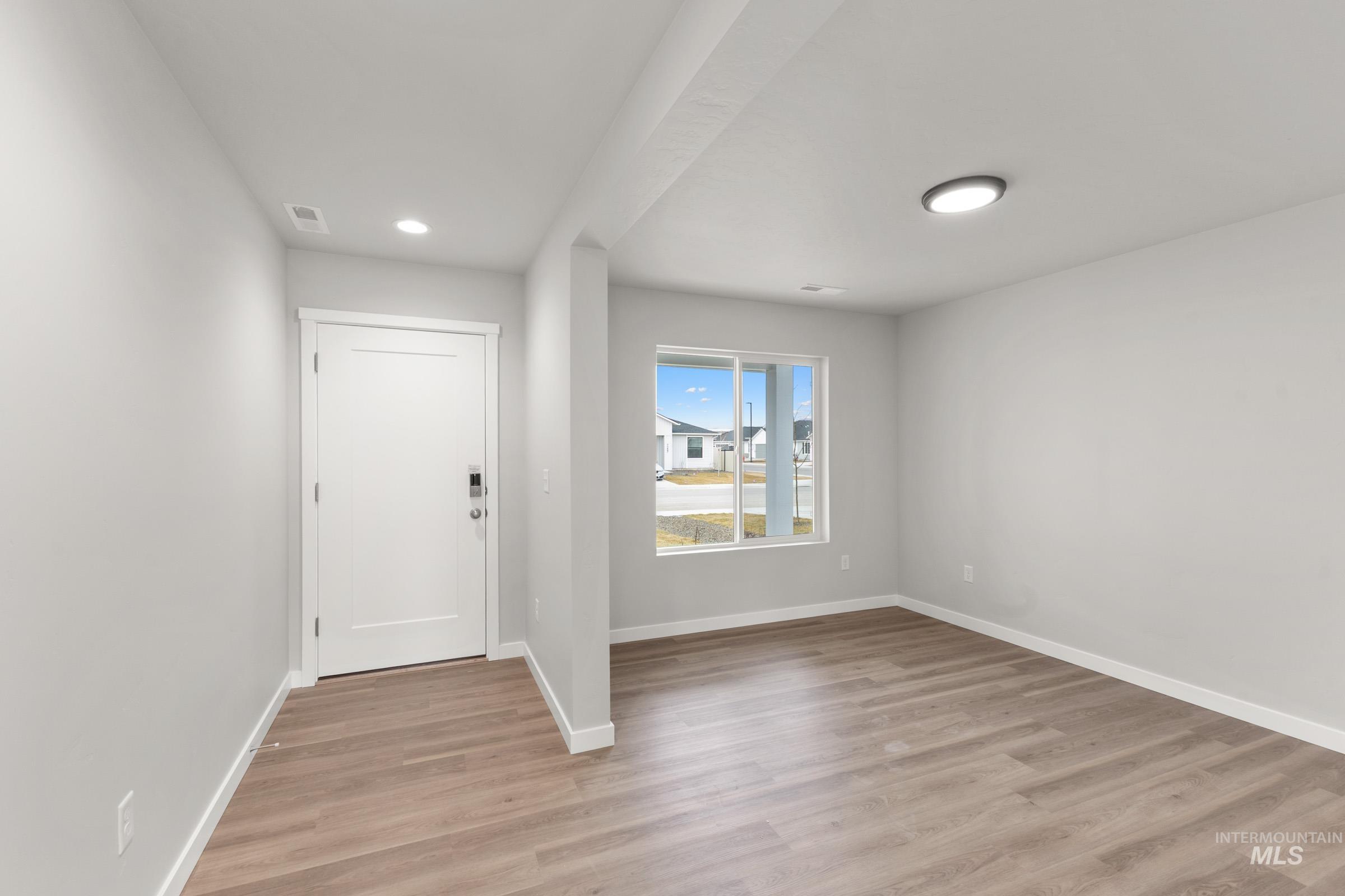 461 Waverly Avenue Middleton, ID 83644 - Photo 2 of 22 Entryway with light wood finished floors and recessed lighting