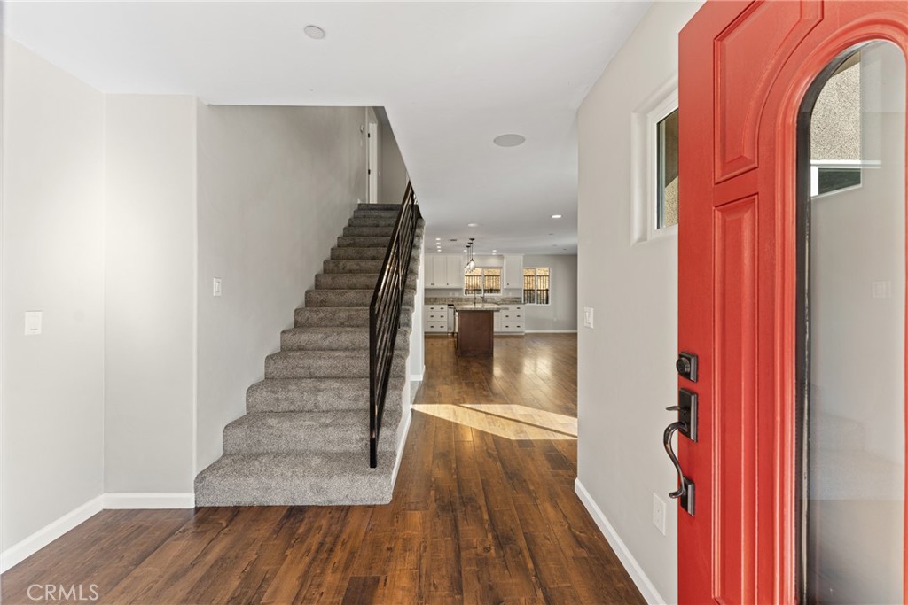 30300 Live Oak Canyon Road Redlands, CA 92373 - Photo 15 of 67 a view of entryway and hall with wooden floor