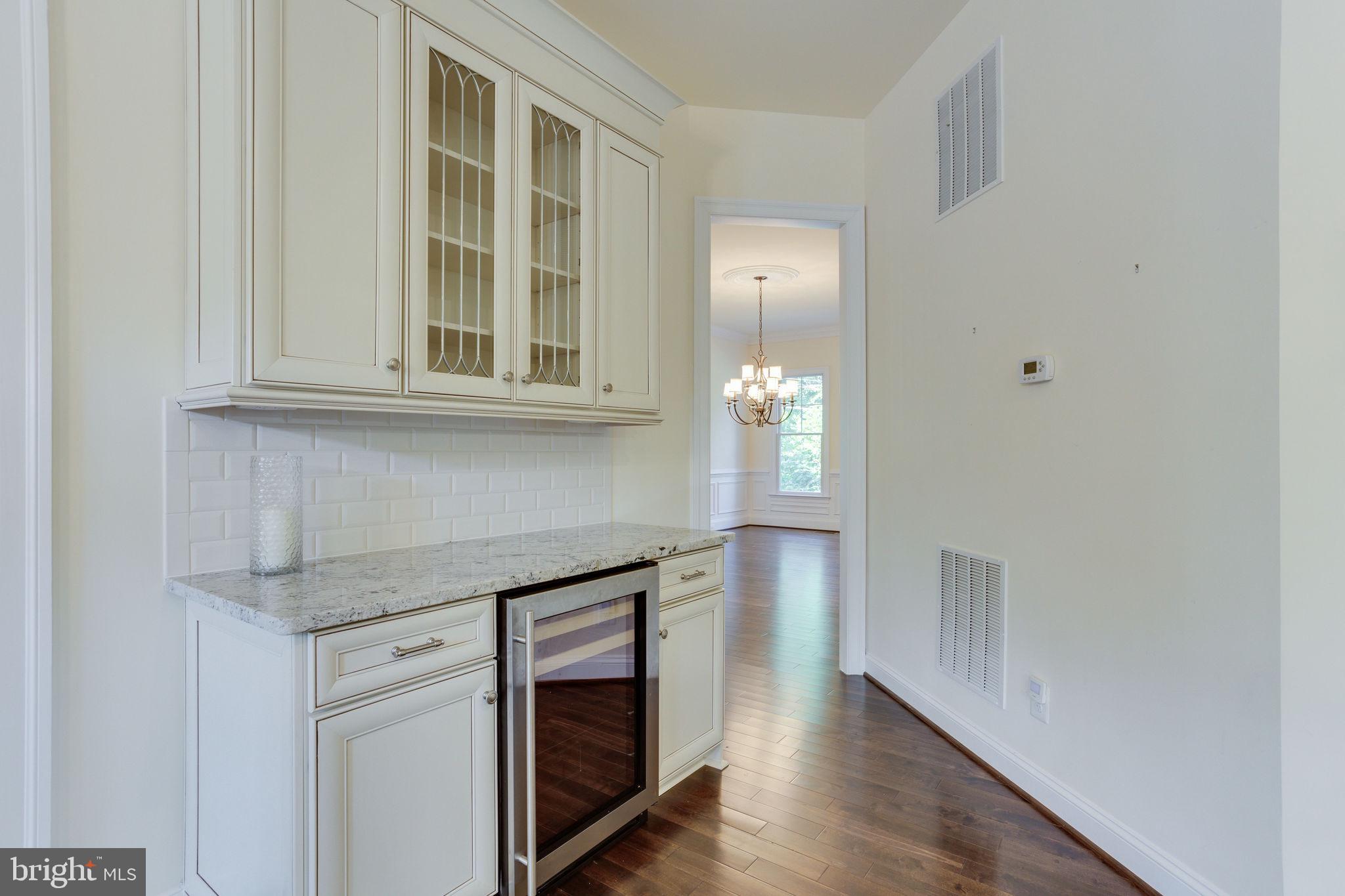 1709 Besley Road Vienna, VA 22182 - Photo 14 of 51 Wine cooler close to Family room.