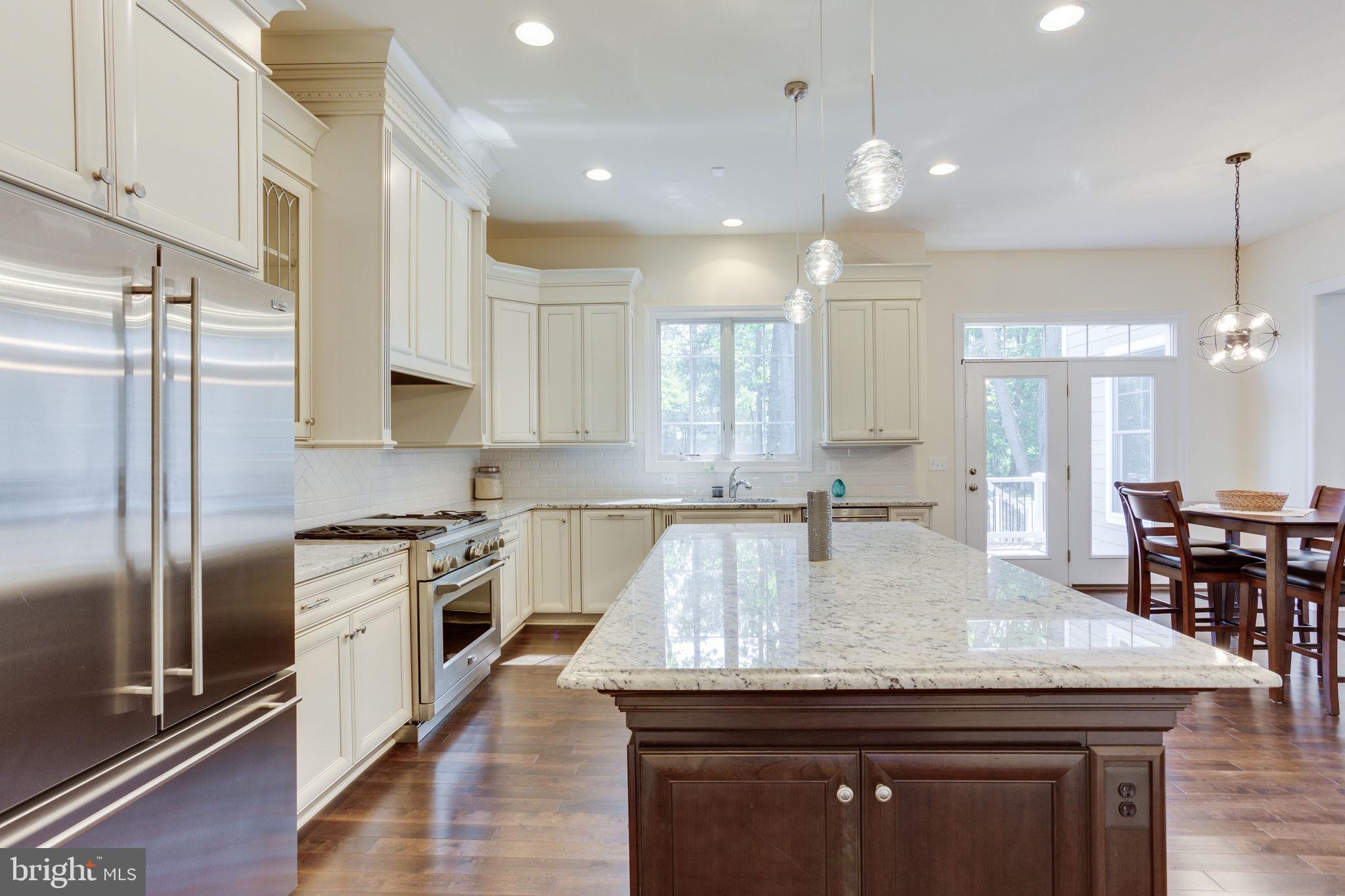1709 Besley Road Vienna, VA 22182 - Photo 10 of 51 Large island with with LED pendants (Lightopia)