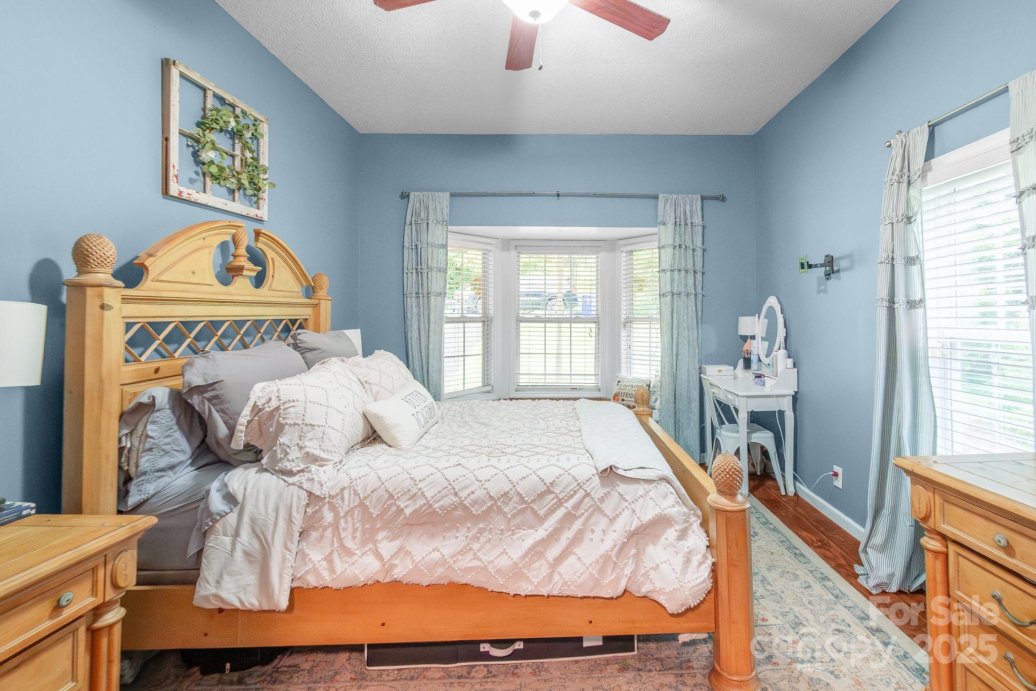 2578 Laboratory Road Lincolnton, NC 28092 - Photo 15 of 34 a bedroom with a bed and a window