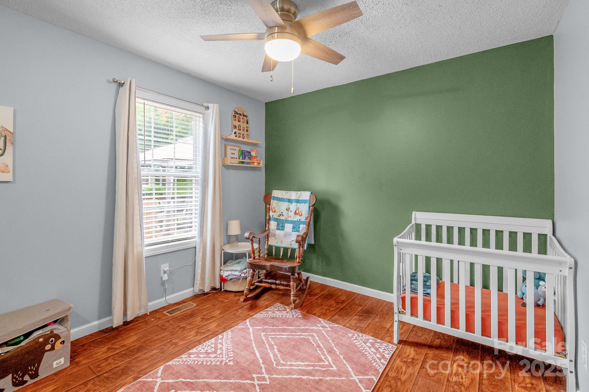 2578 Laboratory Road Lincolnton, NC 28092 - Photo 19 of 34 a bedroom with furniture and a window