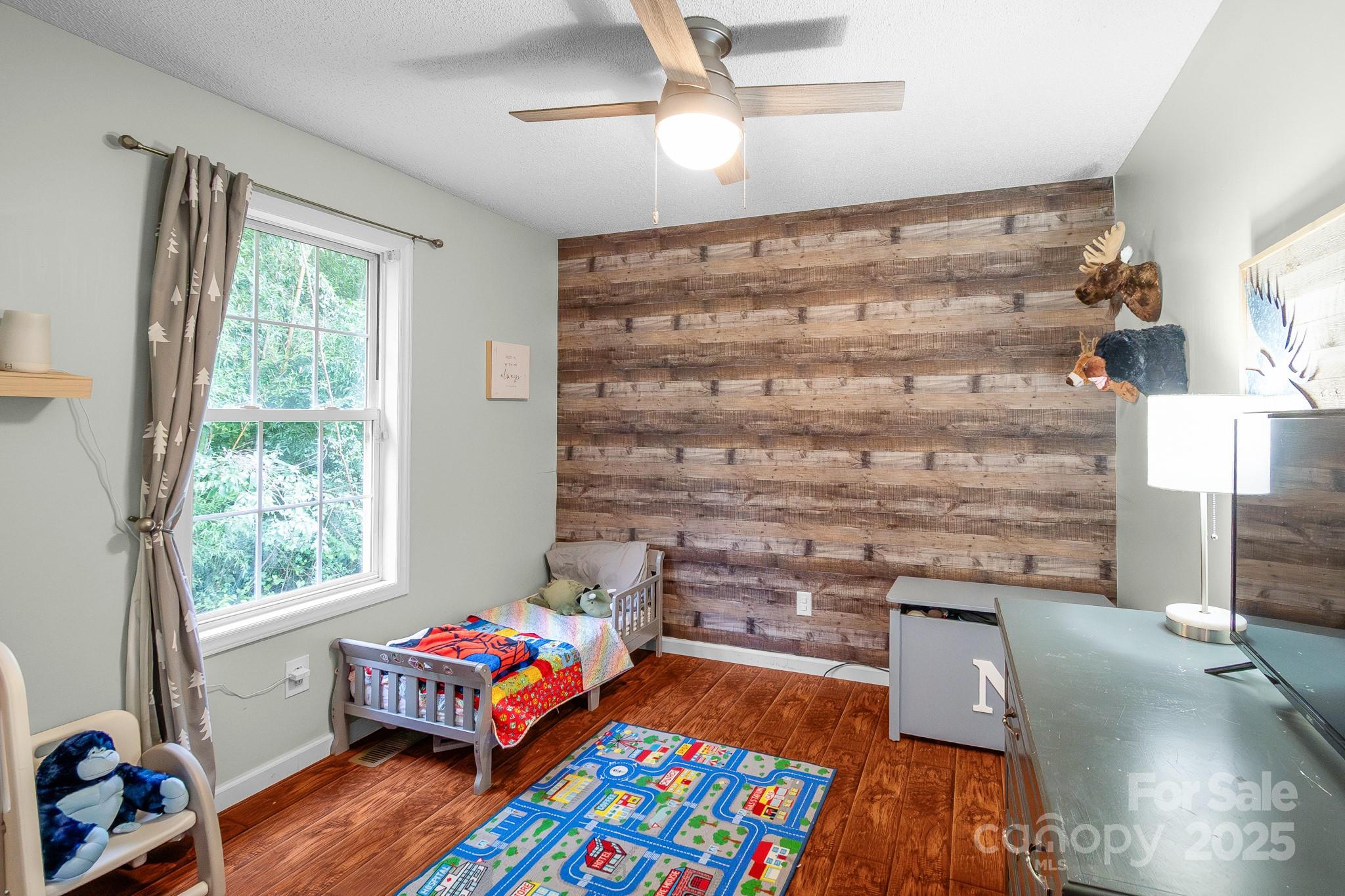 2578 Laboratory Road Lincolnton, NC 28092 - Photo 25 of 34 a bedroom with a bed and a window