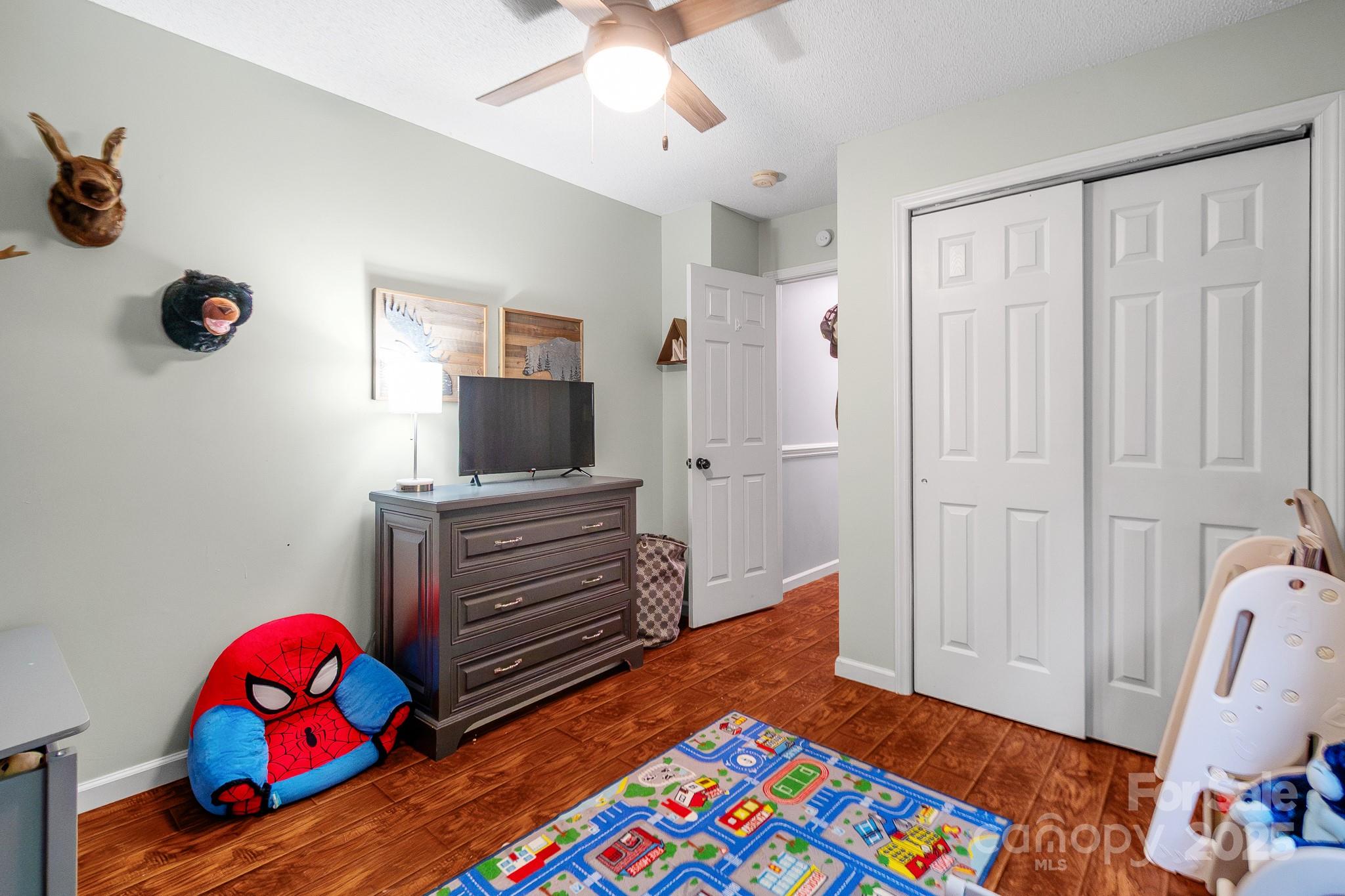 2578 Laboratory Road Lincolnton, NC 28092 - Photo 26 of 34 a living room with furniture and a flat screen tv