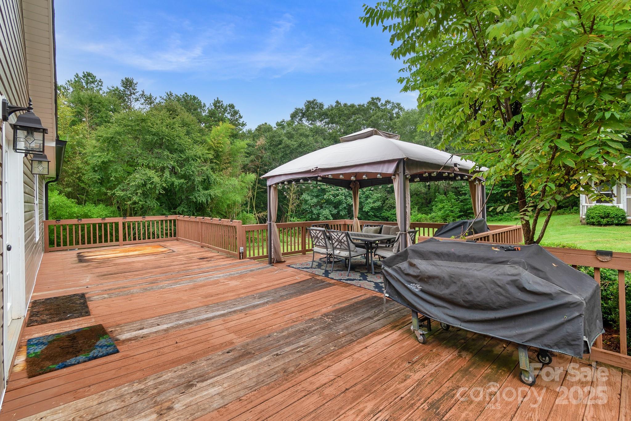 2578 Laboratory Road Lincolnton, NC 28092 - Photo 28 of 34 a view of backyard with hardwood floor and outdoor seating