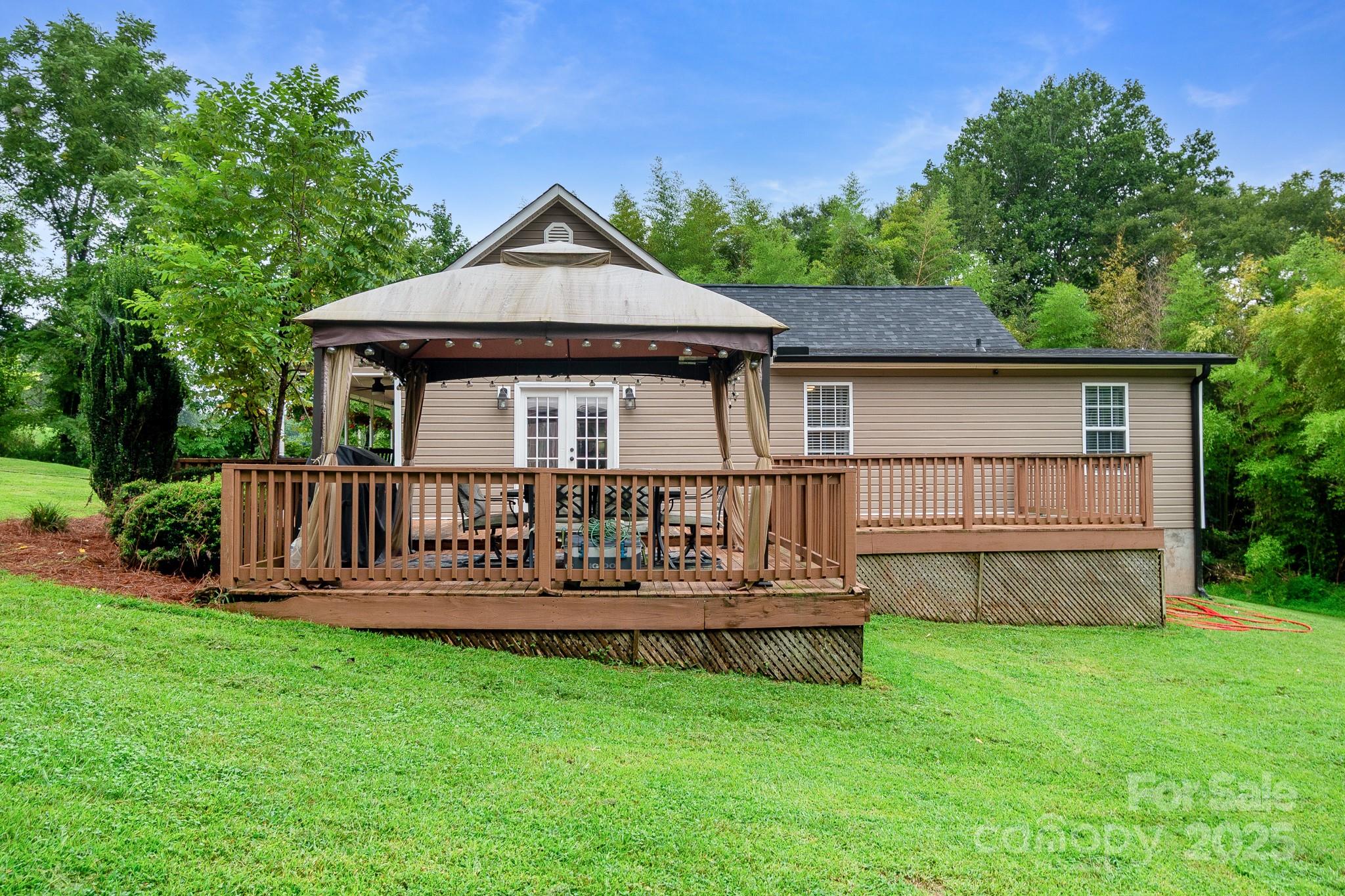 2578 Laboratory Road Lincolnton, NC 28092 - Photo 31 of 34 a view of a house with a yard and deck