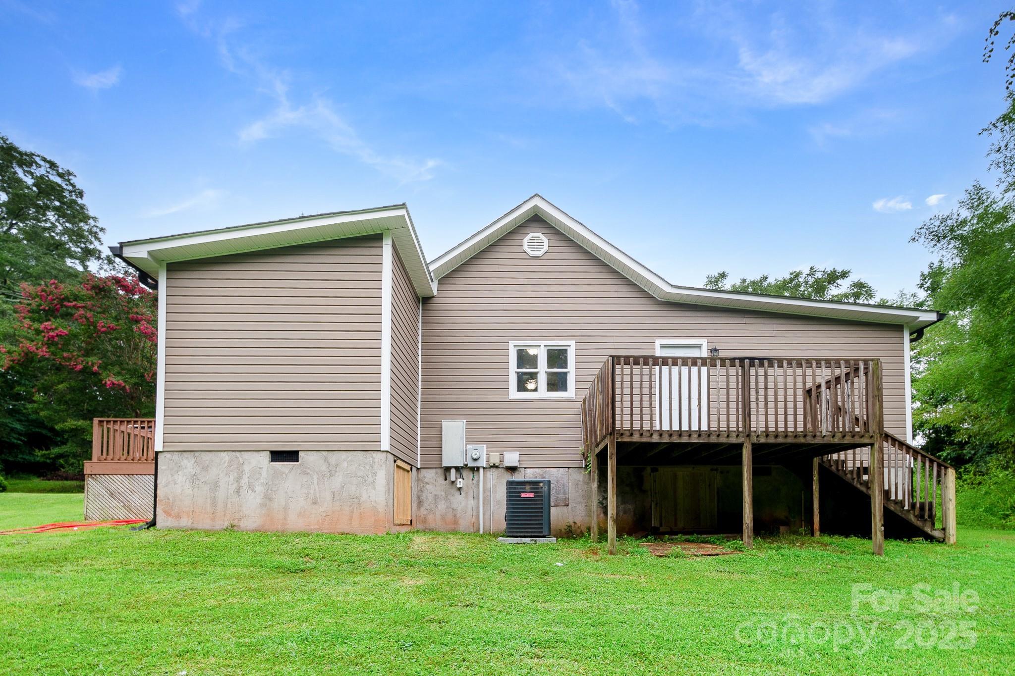 2578 Laboratory Road Lincolnton, NC 28092 - Photo 32 of 34 a front view of a house with a garden and yard