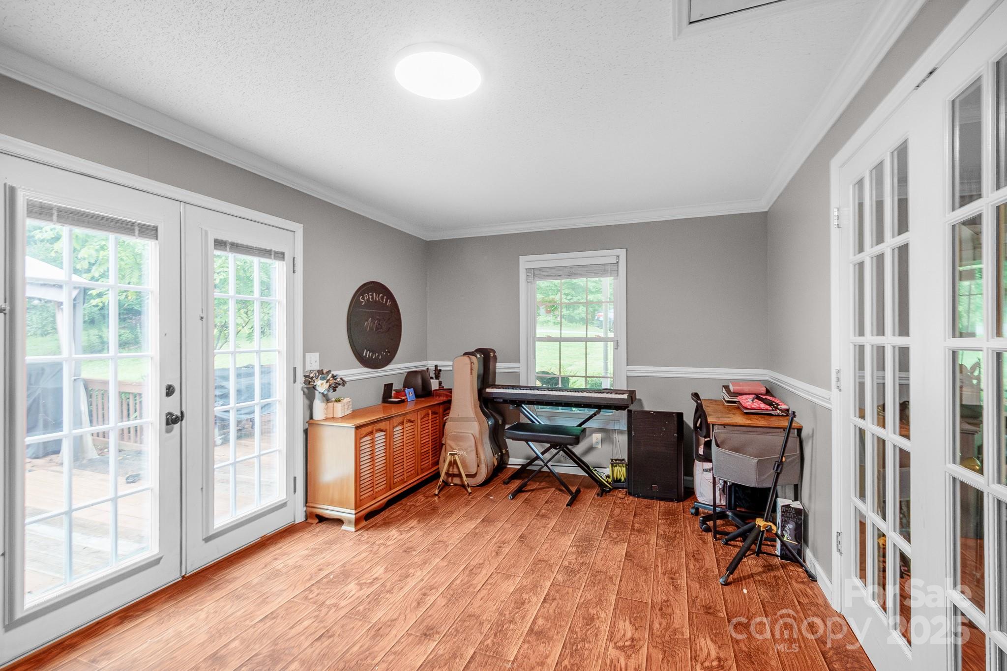 2578 Laboratory Road Lincolnton, NC 28092 - Photo 8 of 34 a view of a workspace with furniture and a window