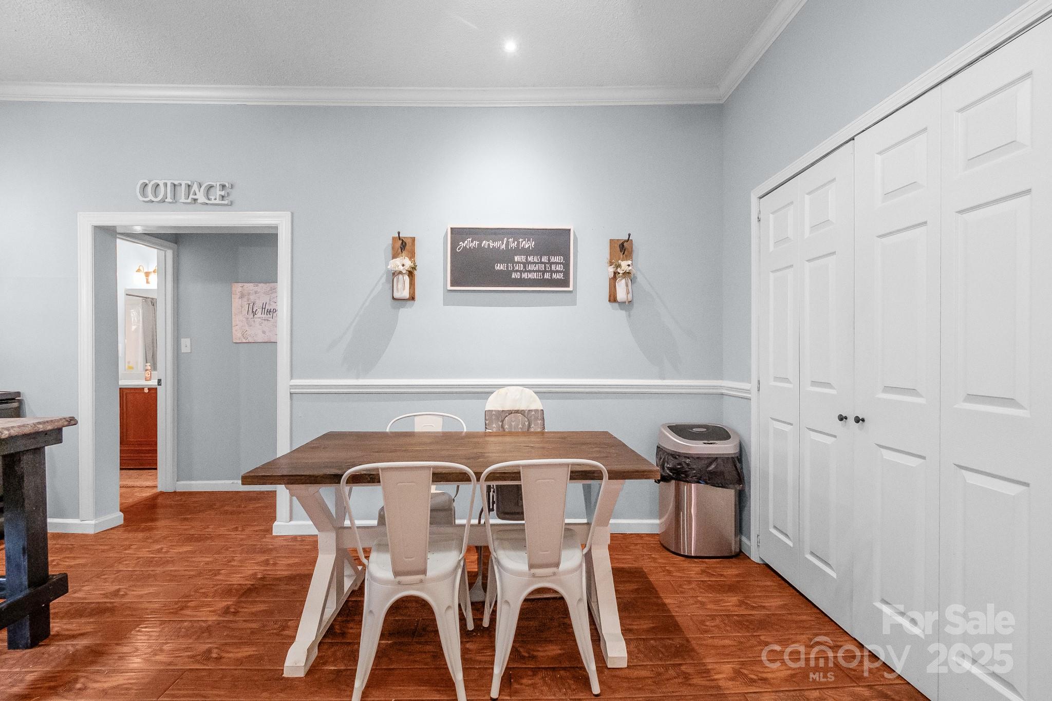 2578 Laboratory Road Lincolnton, NC 28092 - Photo 10 of 34 a view of a dining room with furniture and wooden floor