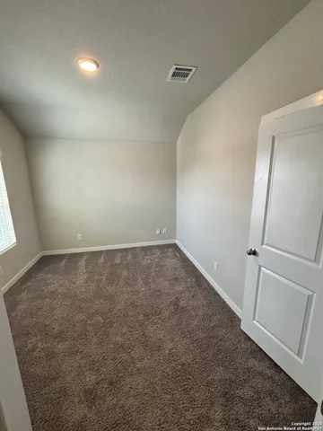 an empty room with a natural light