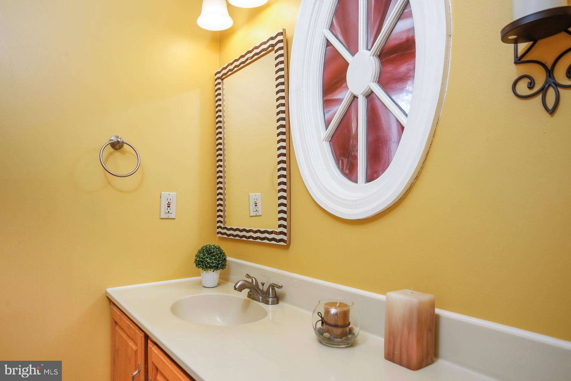 45 Main Street Chesterbrook, PA 19087 - Photo 12 of 36 a bathroom with a sink and a mirror