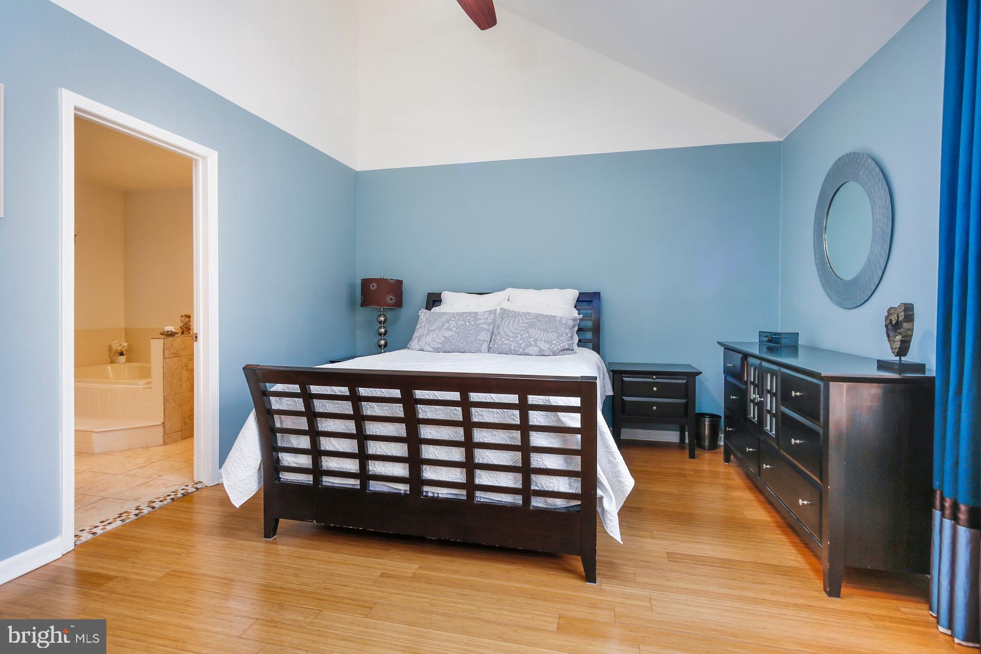 45 Main Street Chesterbrook, PA 19087 - Photo 15 of 36 a bedroom with a bed and wooden floor