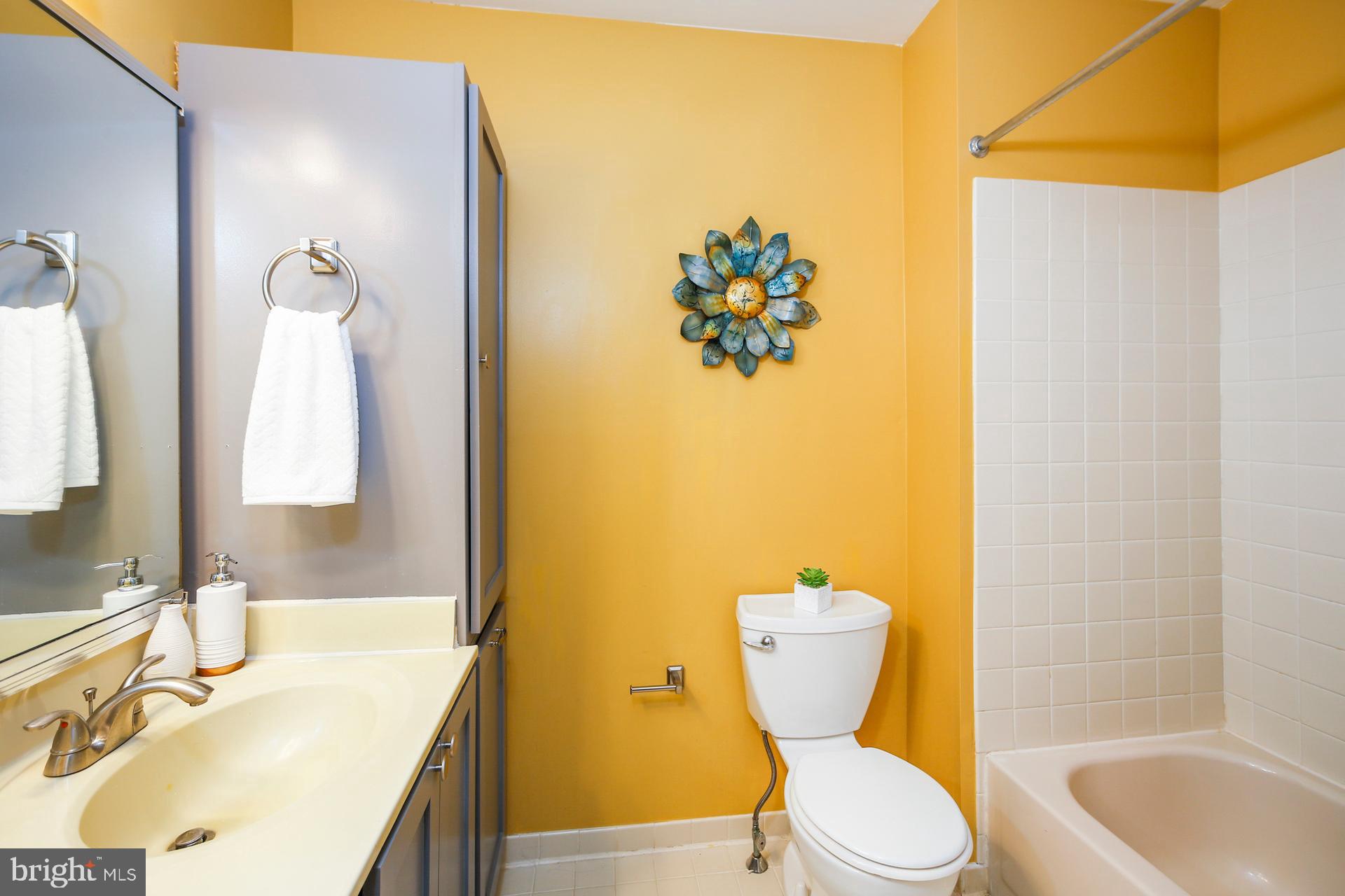45 Main Street Chesterbrook, PA 19087 - Photo 22 of 36 a bathroom with a sink mirror vanity and toilet