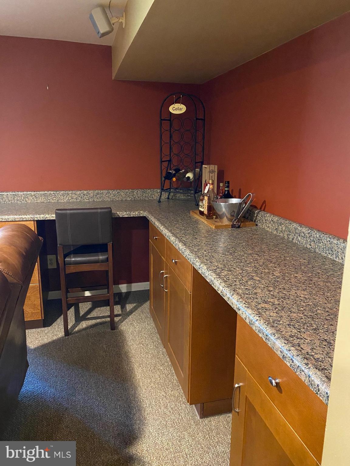 45 Main Street Chesterbrook, PA 19087 - Photo 25 of 36 a kitchen with a sink a stove and chairs