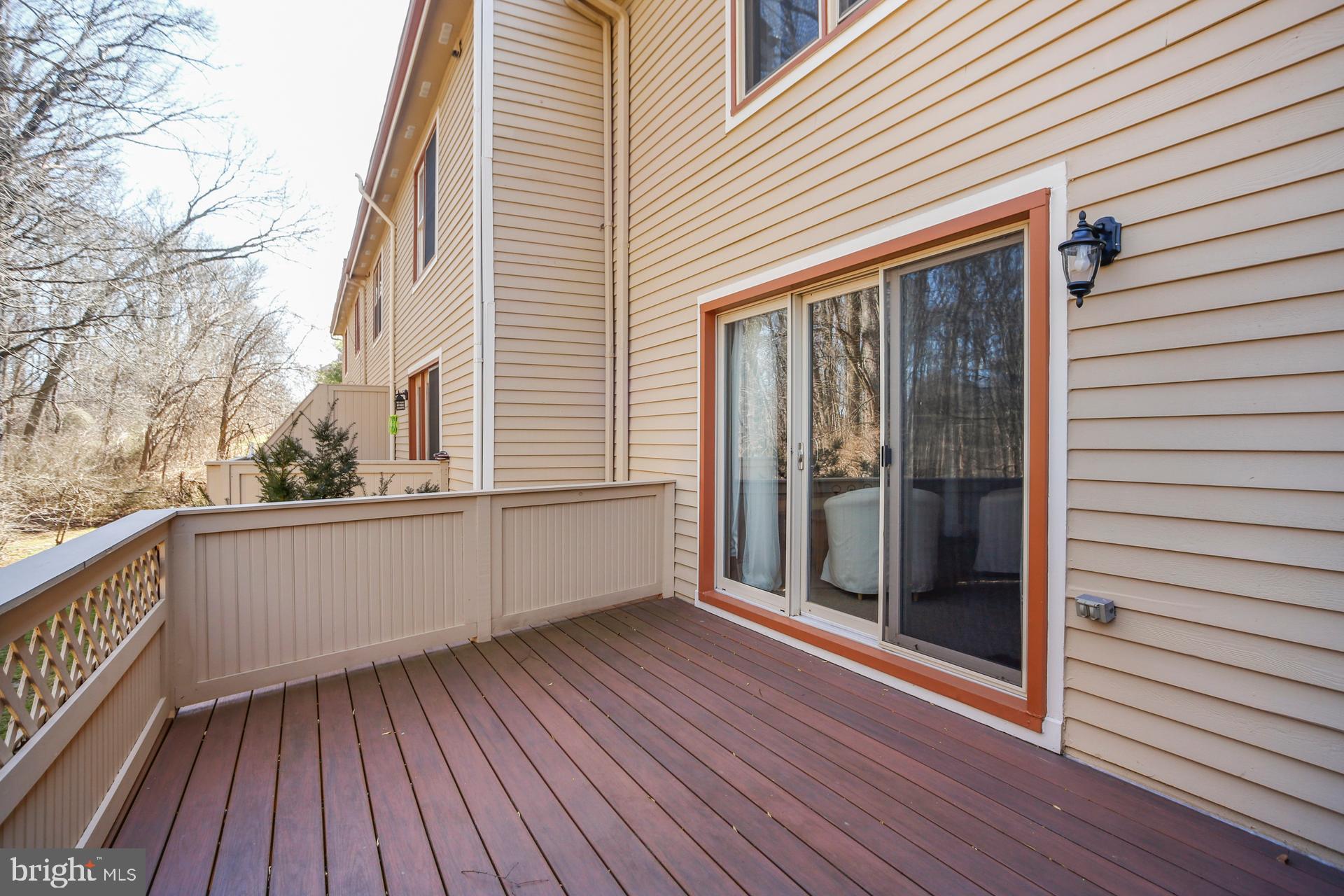 45 Main Street Chesterbrook, PA 19087 - Photo 28 of 36 a view of a balcony with wooden floor and fence