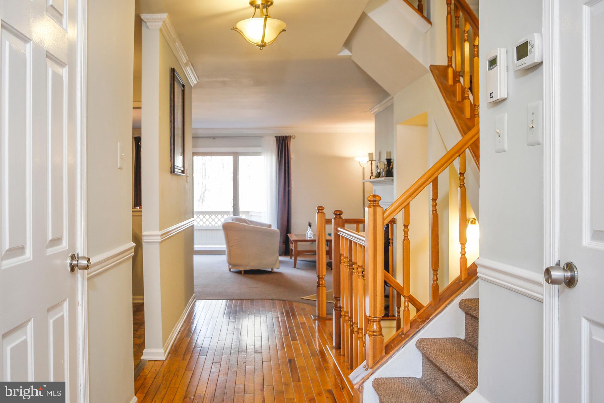 45 Main Street Chesterbrook, PA 19087 - Photo 10 of 36 a view of entryway and hall with wooden floor