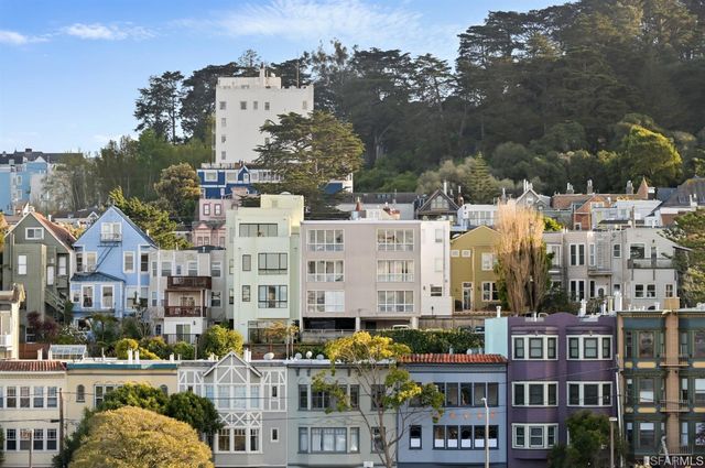 a view of city with tall buildings