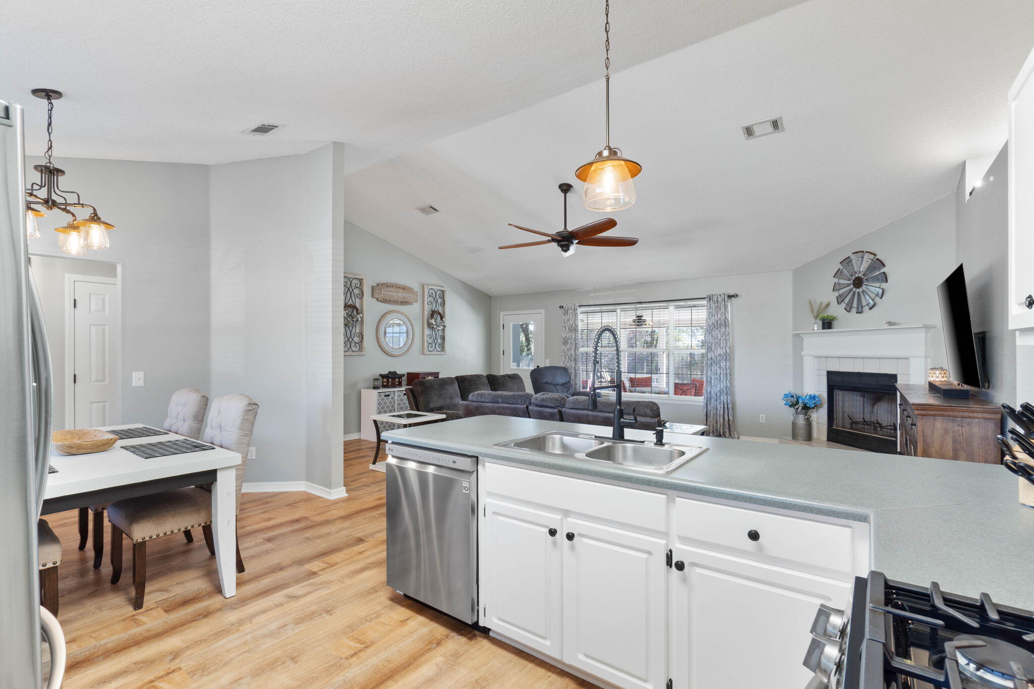 6779 Cedar Ridge Circle Milton, FL 32570 - Photo 16 of 46 a kitchen with a sink appliances and a counter space