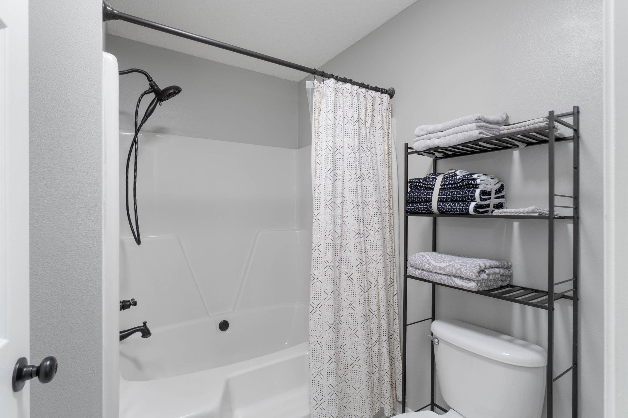 6779 Cedar Ridge Circle Milton, FL 32570 - Photo 25 of 46 a bathroom with a shower and a tub