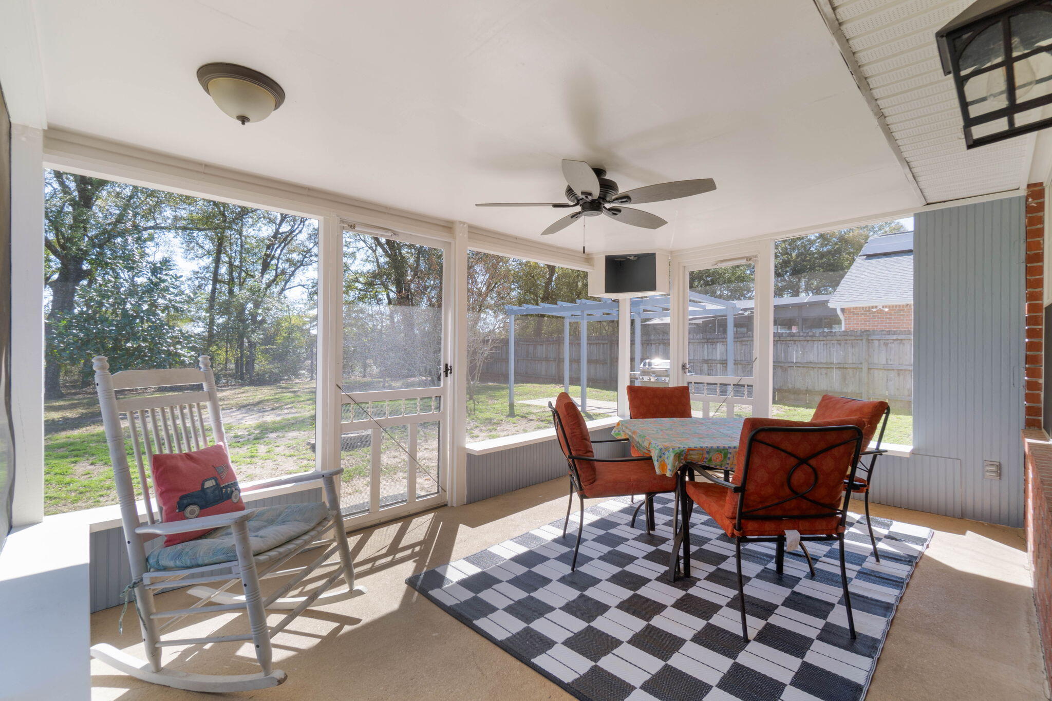 6779 Cedar Ridge Circle Milton, FL 32570 - Photo 31 of 46 a view of a dining room with furniture wooden floor and a chandelier