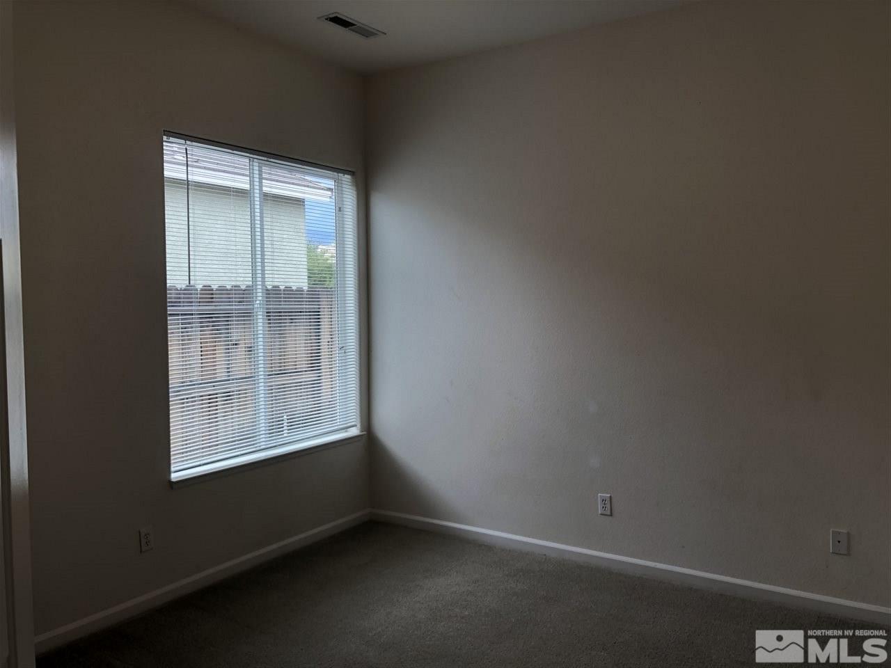 1671 Sewell Drive Reno, NV 89521 - Photo 12 of 16 an empty room with a window