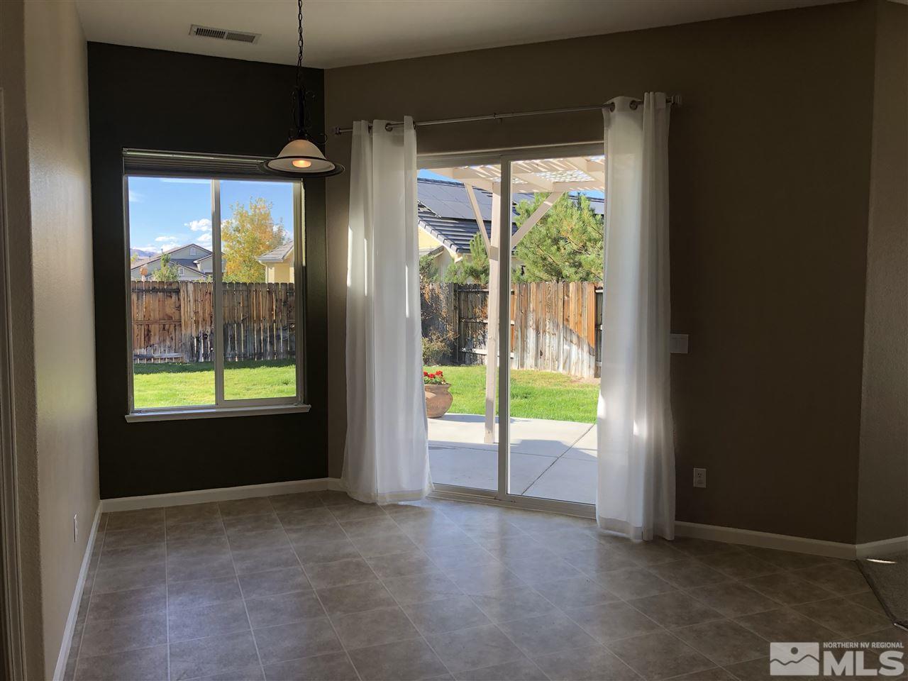 1671 Sewell Drive Reno, NV 89521 - Photo 6 of 16 a view of an empty room and window
