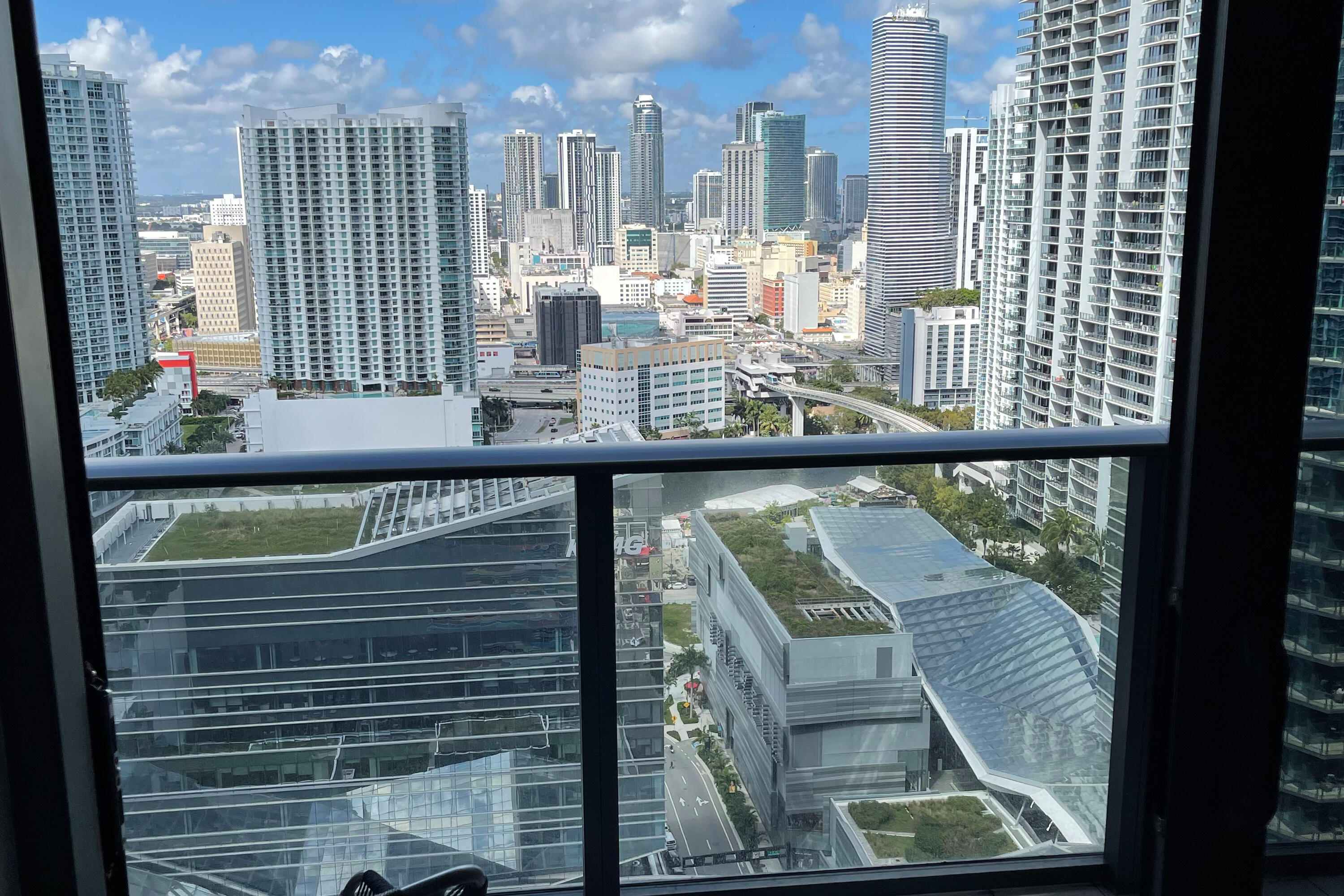 a view of a balcony with chairs