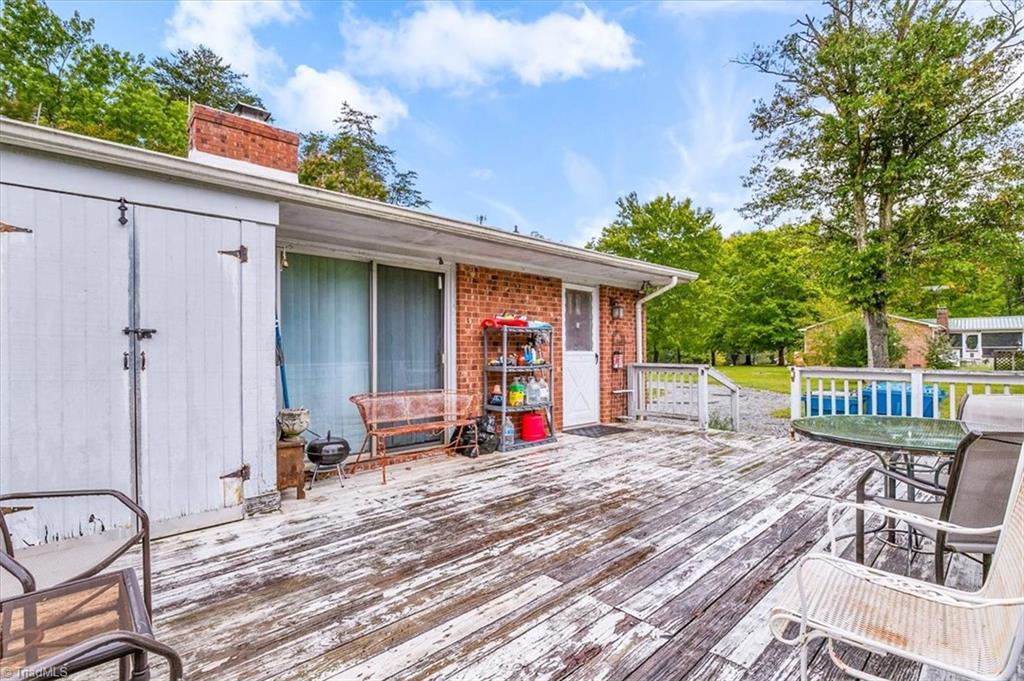 5822 Ruralview Road Gibsonville, NC 27249 - Photo 26 of 35 Back deck, another view