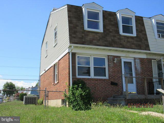 2962 Mallview Road Baltimore, MD 21230 - Photo 1 of 1 a view of a brick house with a yard