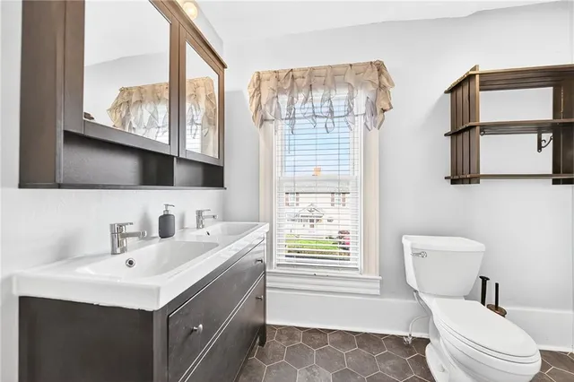 a bathroom with a sink and a toilet