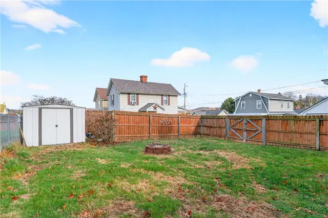 a view of a backyard with plants