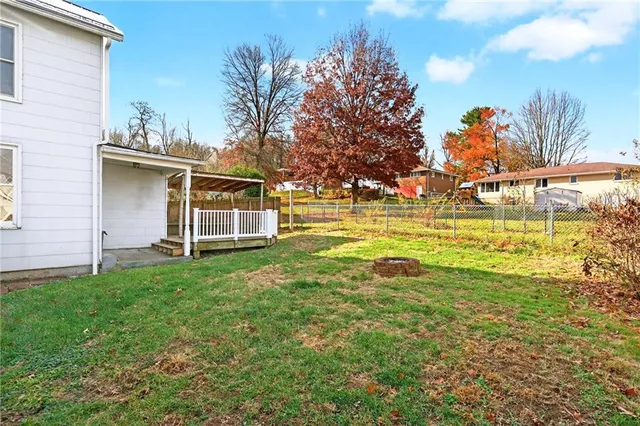 a view of a house with a big yard