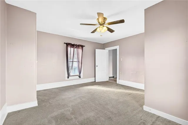 a view of an empty room with window