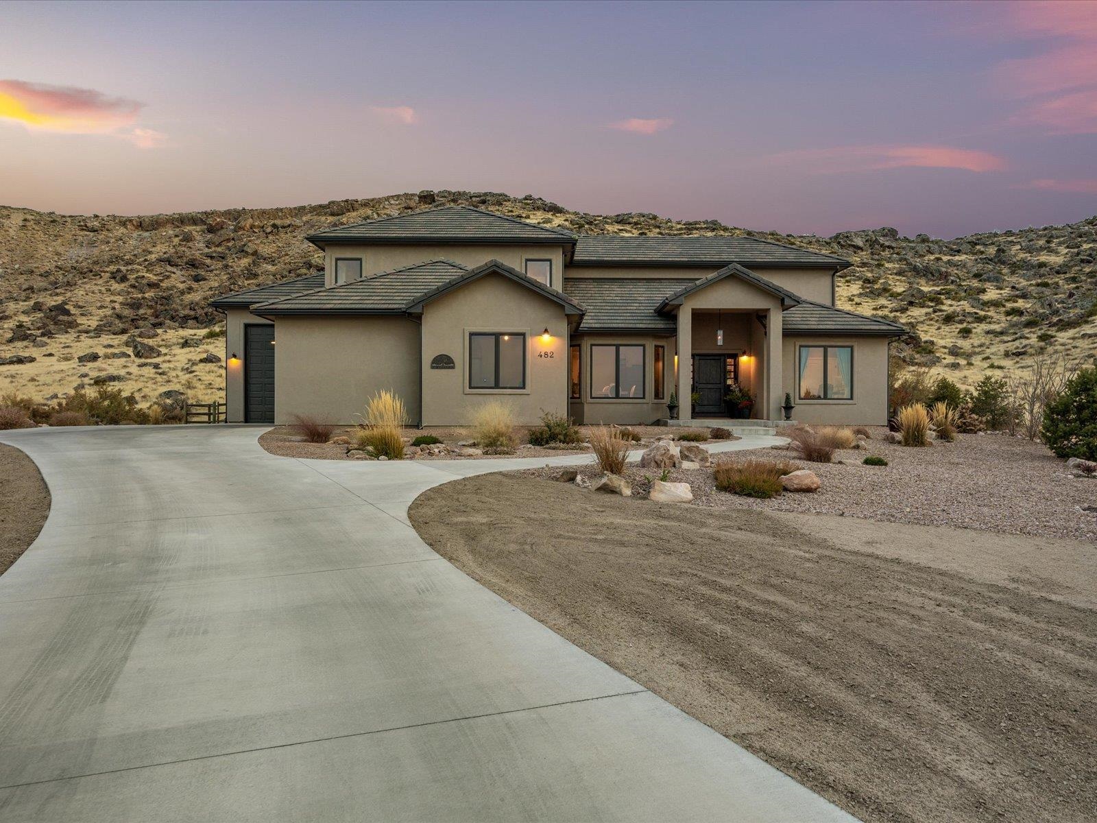 482 Riggs Way Grand Junction, CO 81507 - Photo 1 of 42 a view of a house with a outdoor space