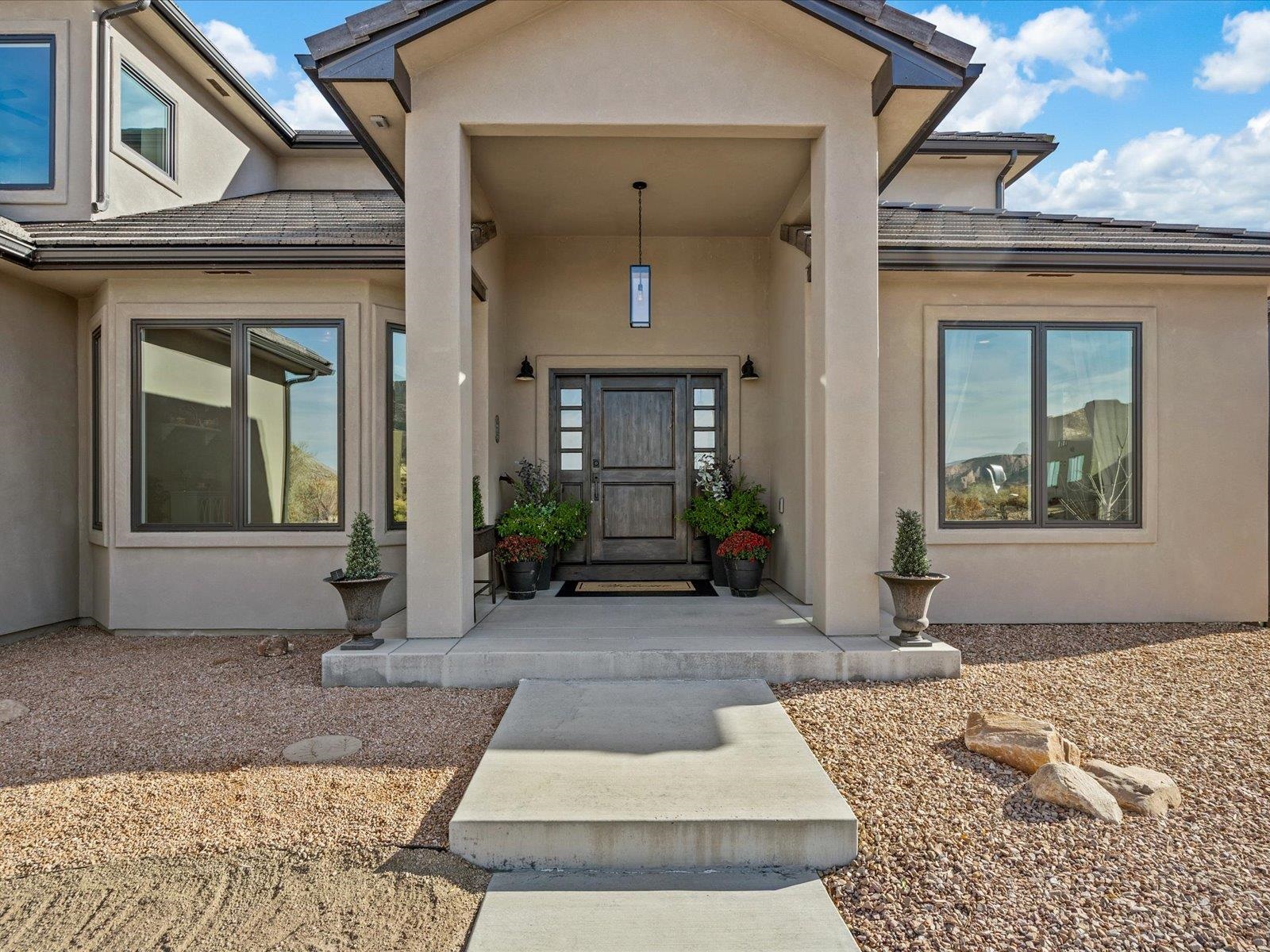 482 Riggs Way Grand Junction, CO 81507 - Photo 2 of 42 a front view of a house