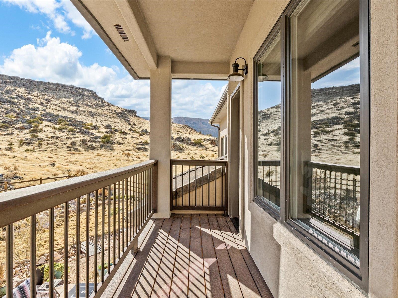 482 Riggs Way Grand Junction, CO 81507 - Photo 24 of 42 a view of a balcony with wooden floor