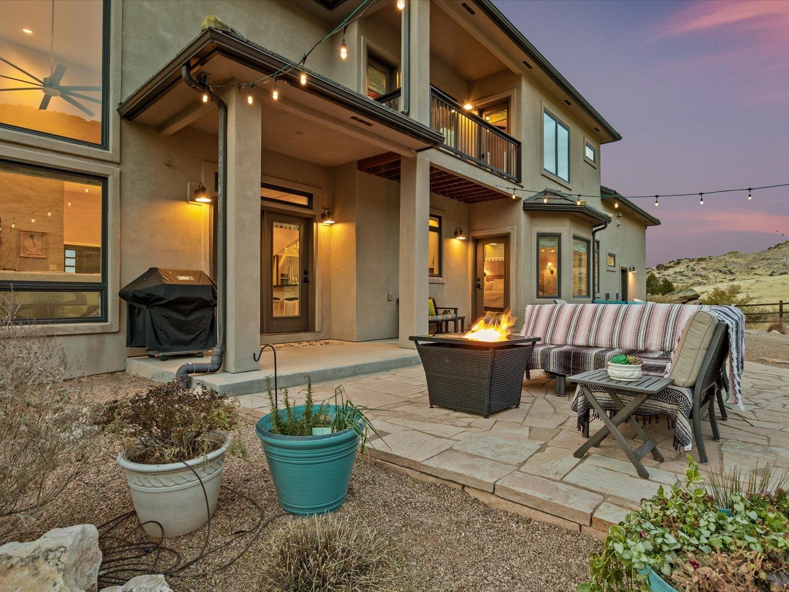 482 Riggs Way Grand Junction, CO 81507 - Photo 28 of 42 a view of a patio with couple of chairs and a potted plant
