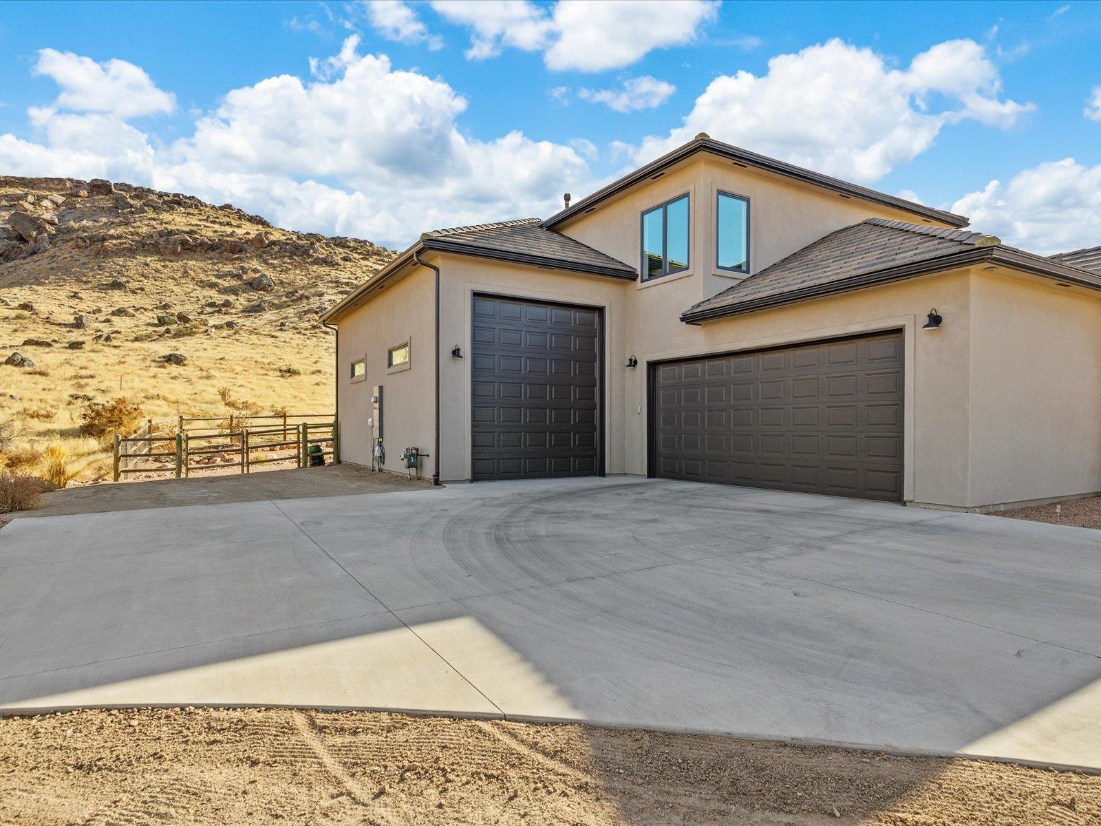482 Riggs Way Grand Junction, CO 81507 - Photo 36 of 42 a front view of a house with a yard