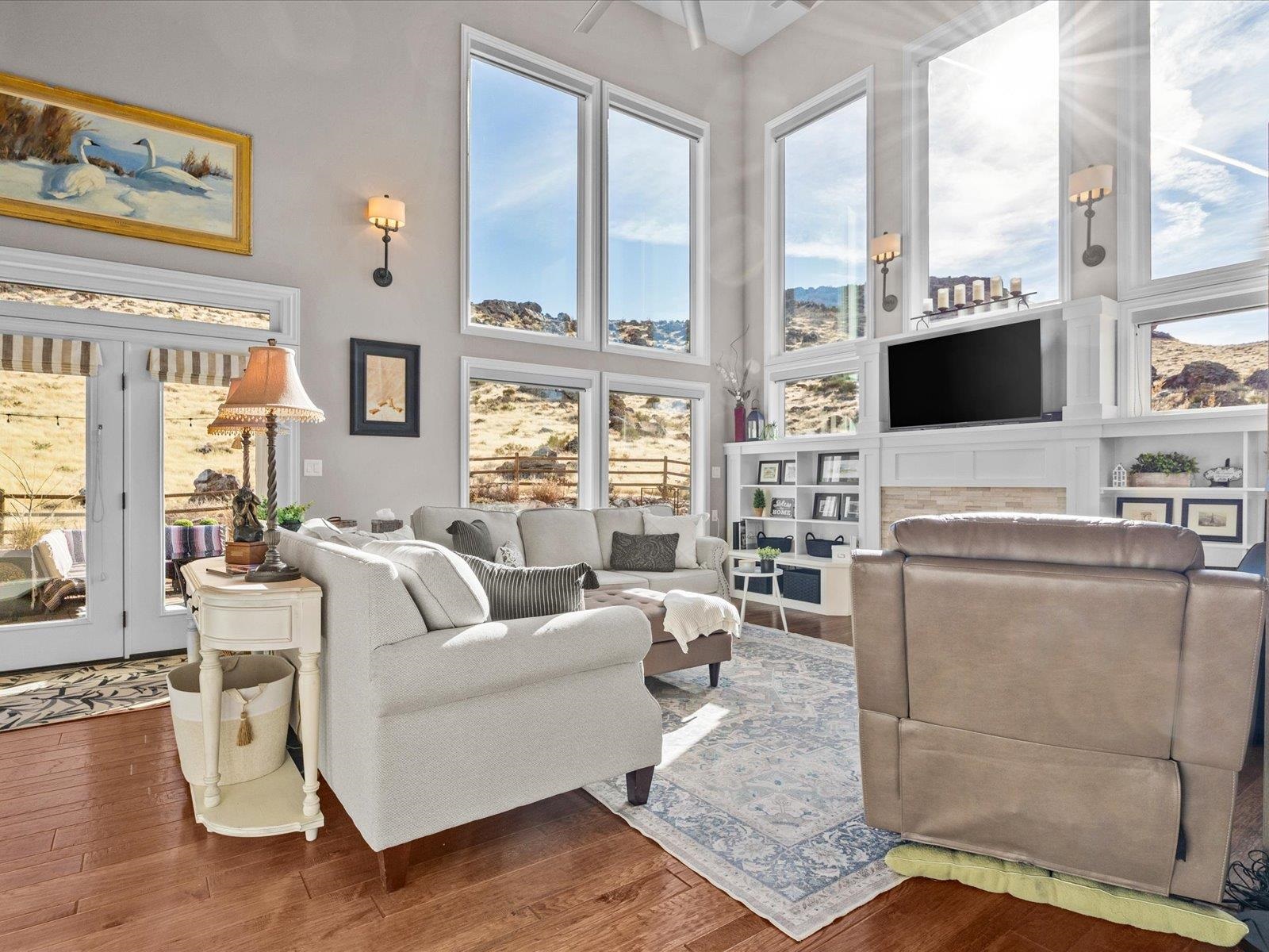 482 Riggs Way Grand Junction, CO 81507 - Photo 6 of 42 a living room with furniture and large windows