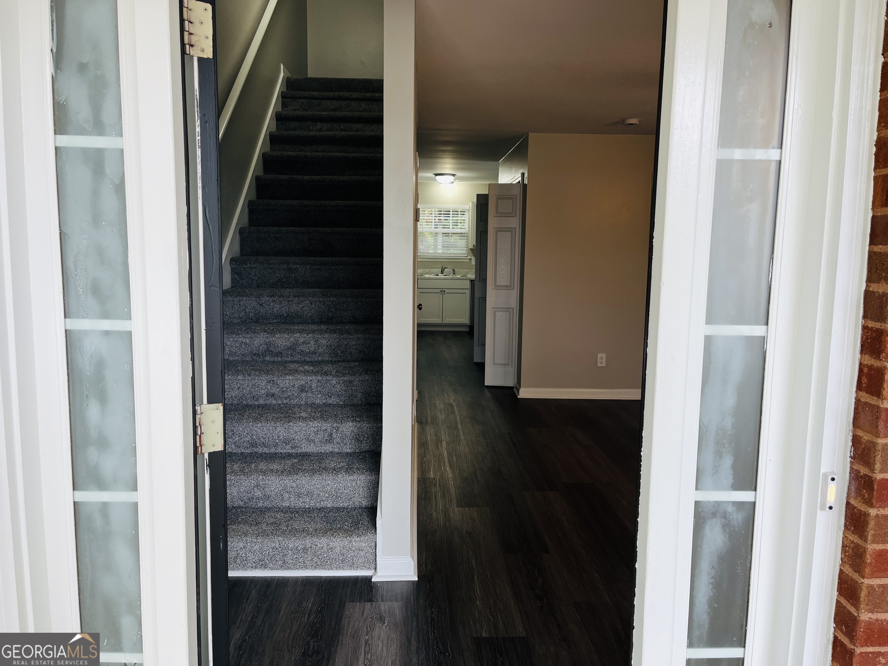 3510 Brookstone Way Union City, GA 30291 - Photo 2 of 32 a view of staircase with white walls and stairs