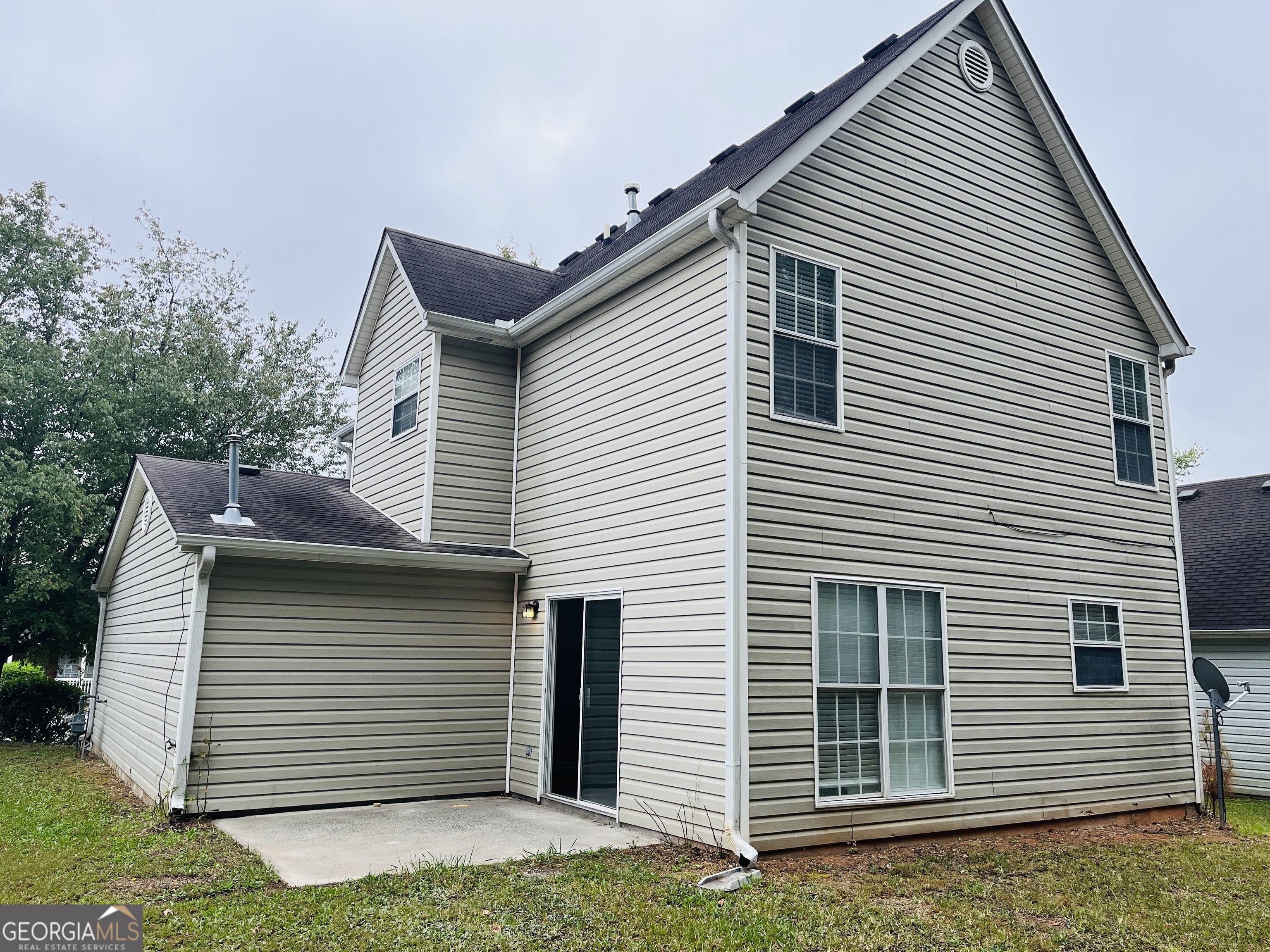 3510 Brookstone Way Union City, GA 30291 - Photo 30 of 32 a front view of a house with garage