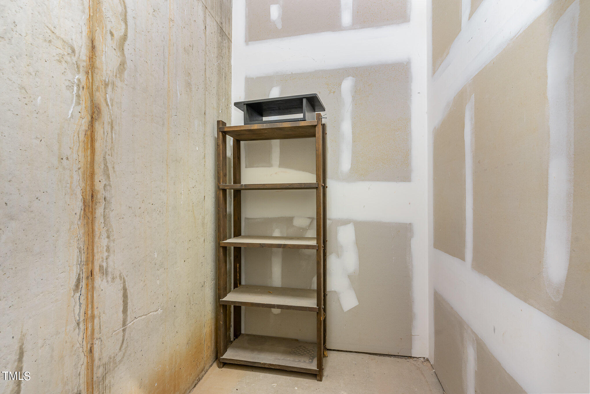 7510 Lead Mine Road, Unit 104 Raleigh, NC 27615 - Photo 22 of 23 Storage room on garage level. 5.3 x 6.5
