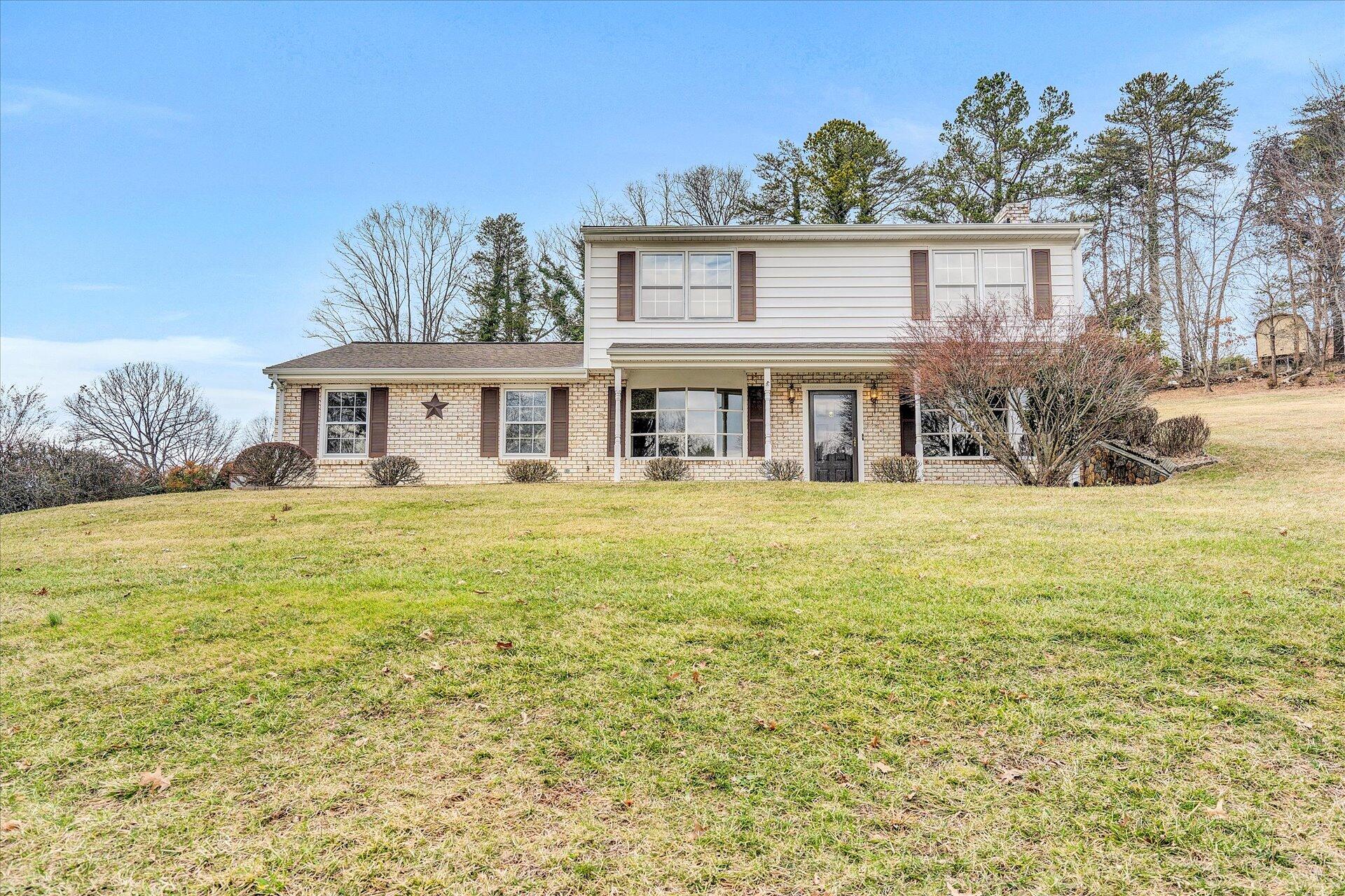 306 Ridgeview Road Blue Ridge, VA 24064 - Photo 1 of 30 a house view with swimming pool and garden space